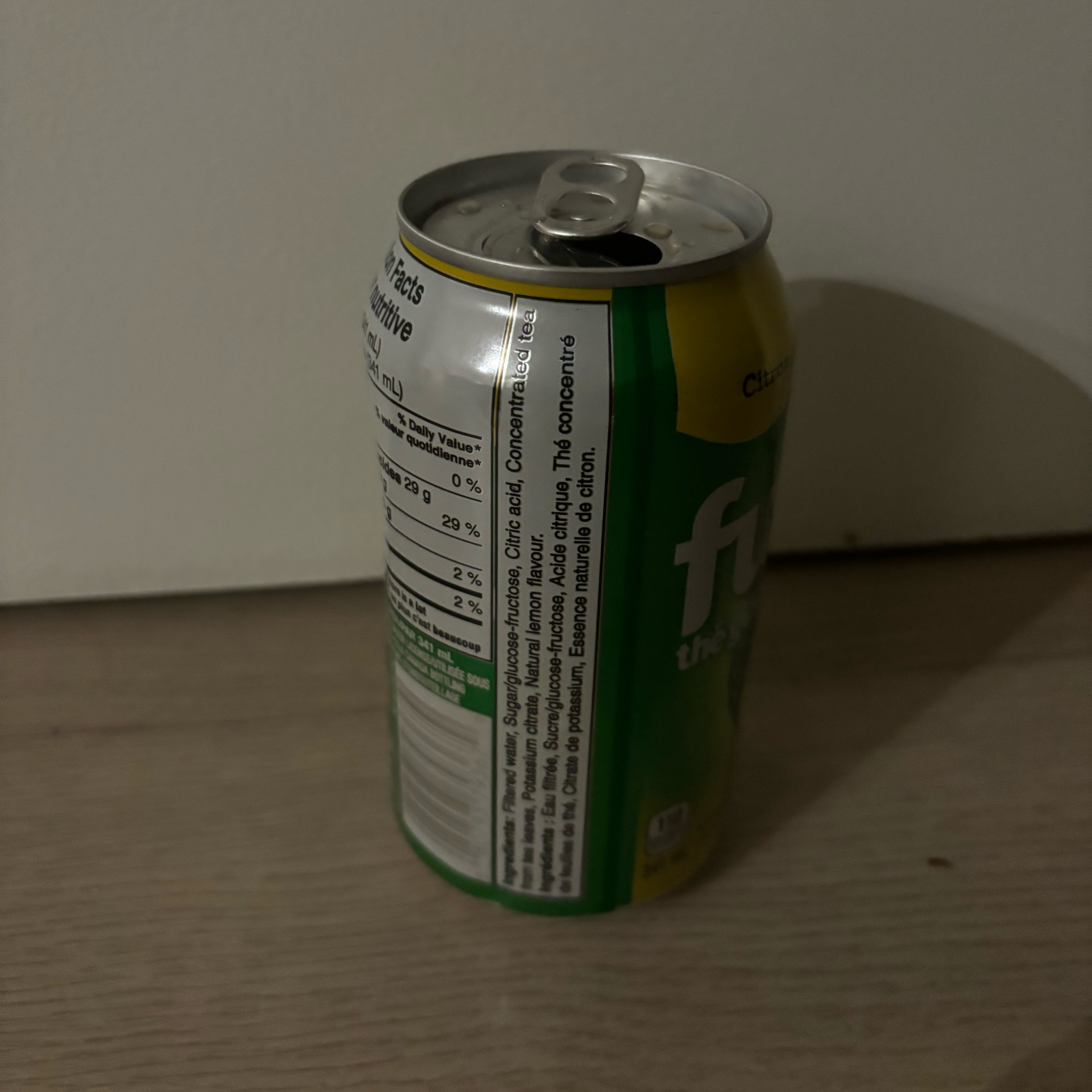 Opening a can of ice tea